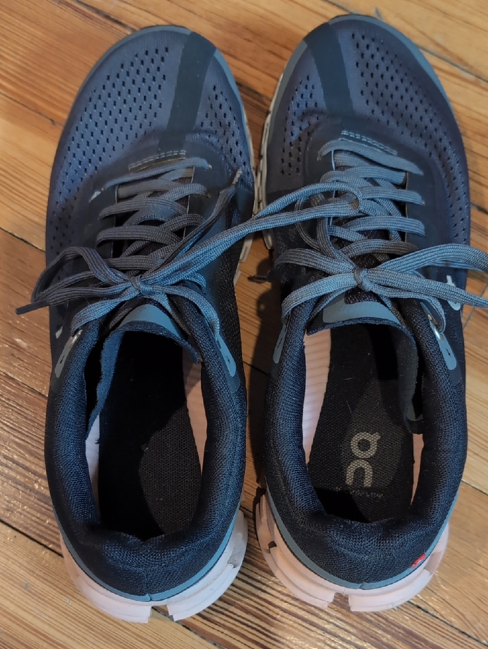 On Running Womens Athletic Shoes in Black With Pink Accents